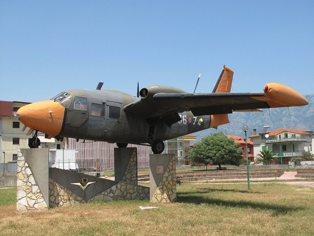 Si tratta del velivolo con numero di costruzione c/n 391 e matricola militare MM 61883. Fa parte del primo lotto di 21 P 166ML1 acquisiti nei primi anni ‘60 dall’ Aeronautica militare ed ha operato prima con la Scuola Plurimotori di Latina (1964) e successivamente con la Regioni Aeree di Milano e Bari. Ha terminato la carriera nelle file della 636a Squadriglia Collegamenti del 36° Stormo di Gioia del Colle dove ha volato come 36-61, 36-71 e 36-76 ma probabilmente non come 36-74.